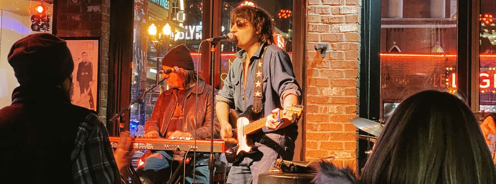 bar singer on guitar in Roanoke
