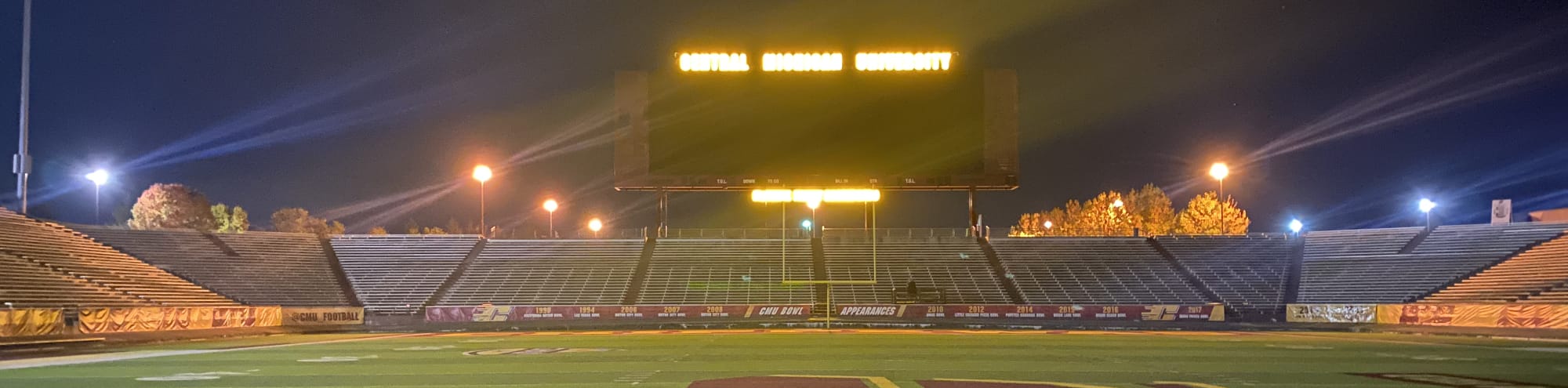 empty football stadium at night under the lights Roanoke